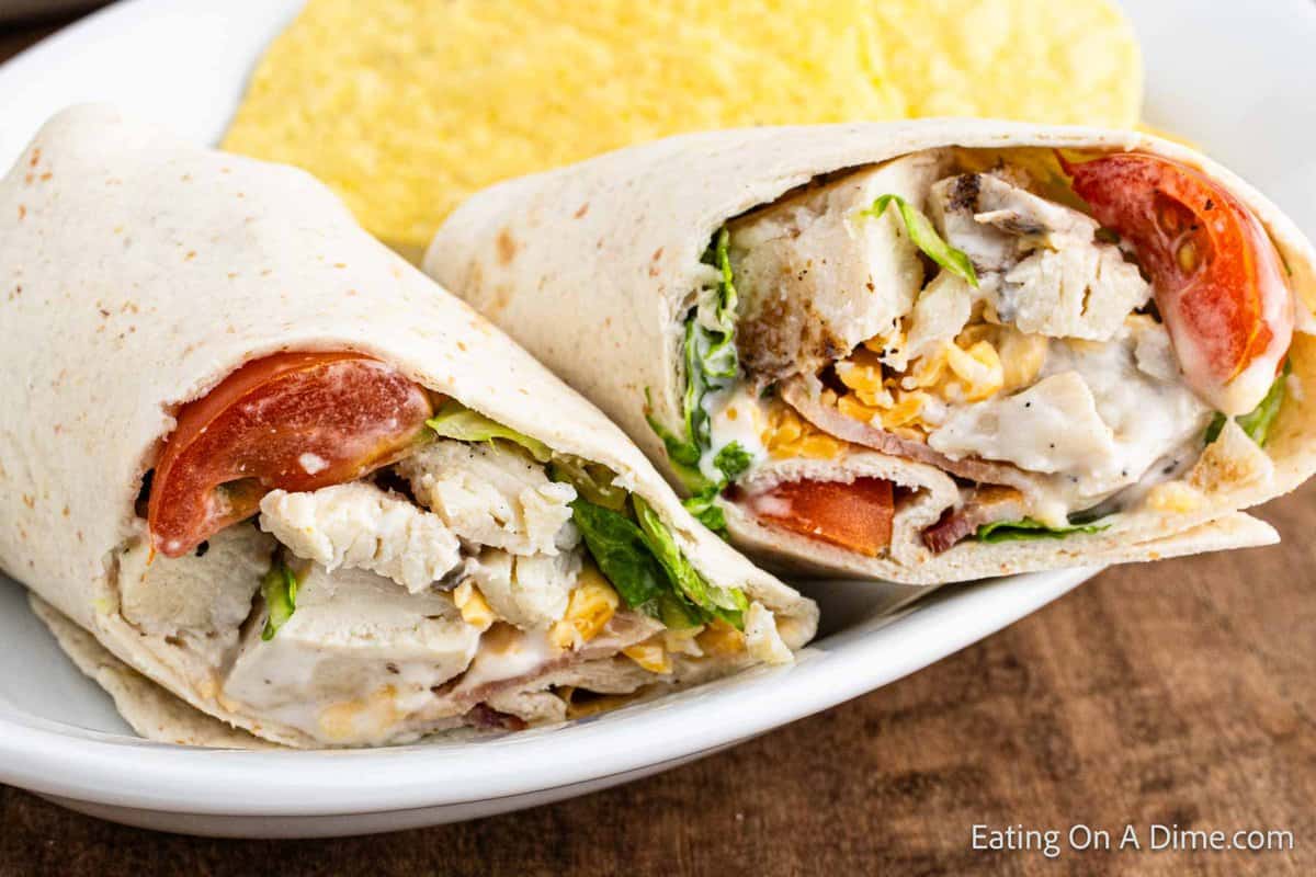 Chicken Bacon Ranch Wraps cut in half on a plate