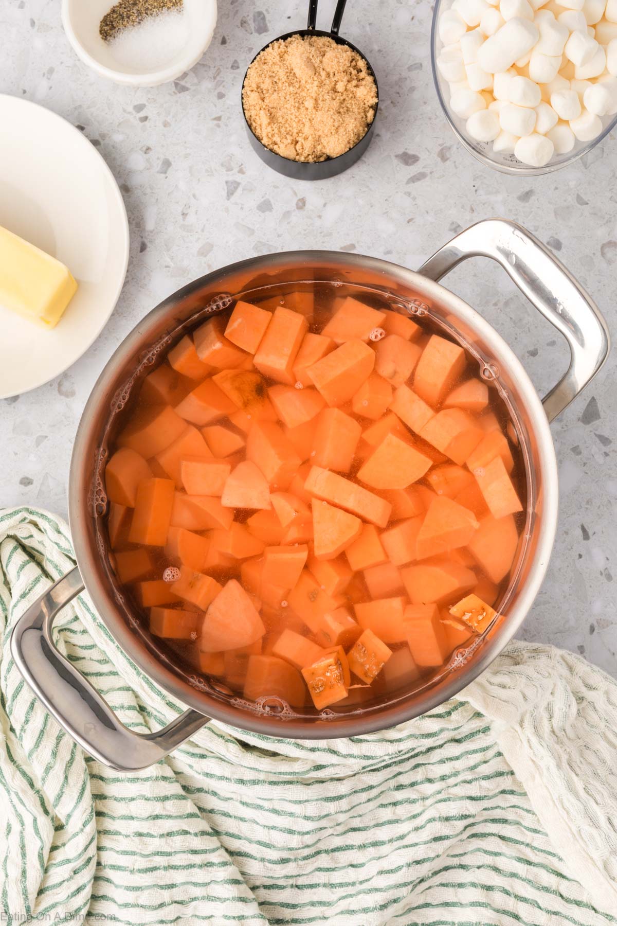 cooking sweet potatoes in a large pot
