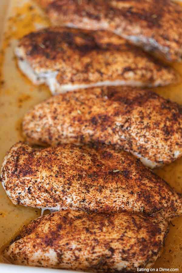 This easy baked chicken recipe has only a few ingredients and takes less than 30 minutes to bake in the oven. Learn how to bake chicken for an easy meal idea that is flavorful. Find out how to cook chicken for shredding, salads and more. How to bake chicken breast in oven. #eatingonadime #howtobakechicken #howtobakechickenintheoven #howtobakechickenintheovensimple #Intheovenhealthy #intheovenrecipes #intheovenjuicy #intheoveneasy