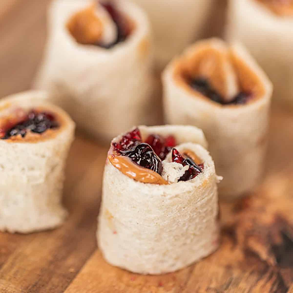 These peanut butter and jelly sushi rolls are perfect or an after school snack or even a fun lunch idea. Kids and adults love them!