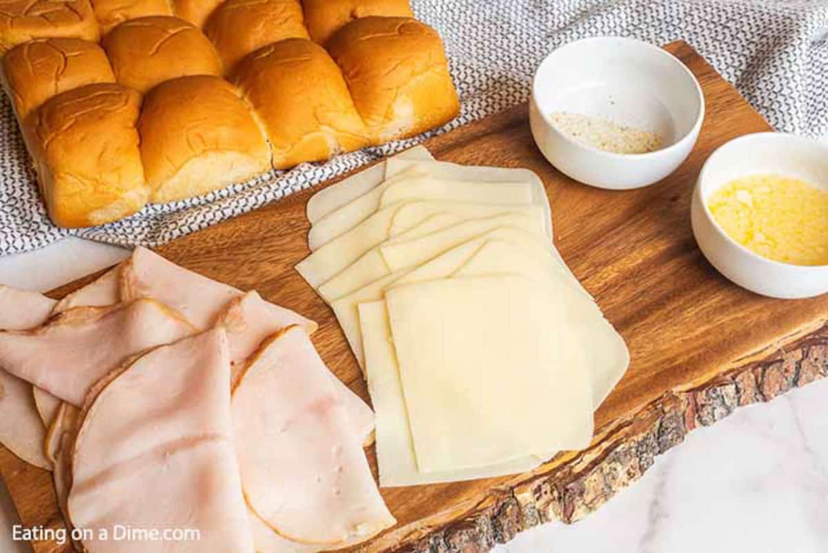 Ingredients - Hawaiian Rolls, slices of mozzarella cheese, deli turkey, garlic salt and melted butter