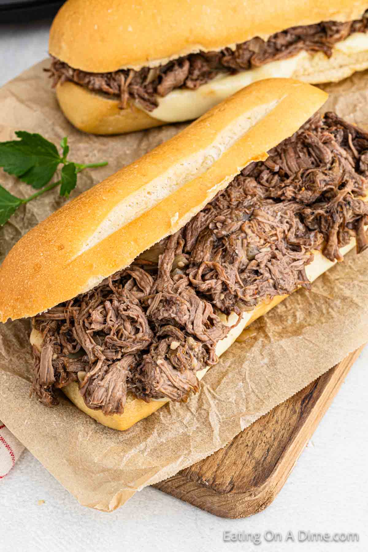 shredded beef sandwiches on a hoagie roll