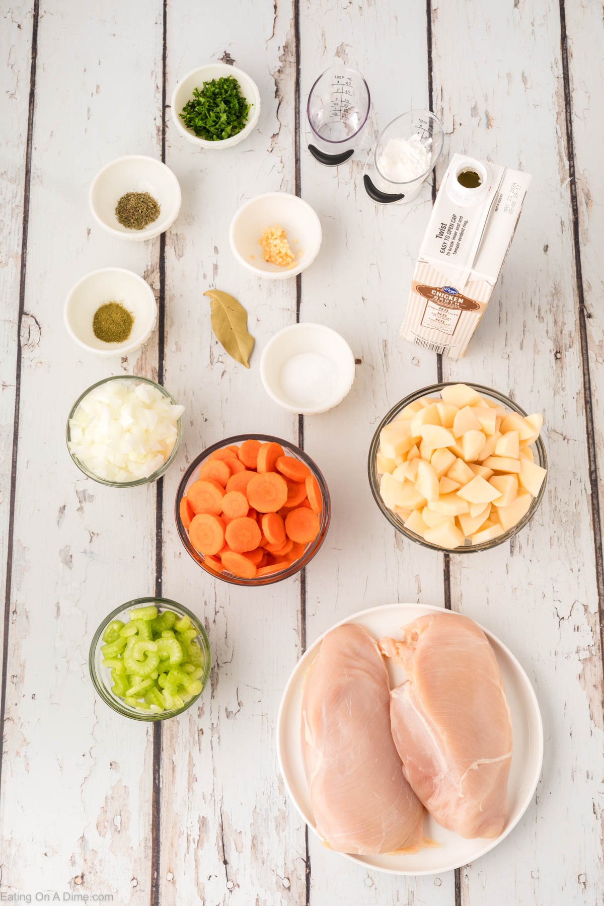 Ingredients needed for Chicken Stew - onion, celery, carrots, potatoes, bay leaf, salt and pepper, garlic, thyme, poultry seasoning, chicken breasts, chicken broth, corn starch, parsley