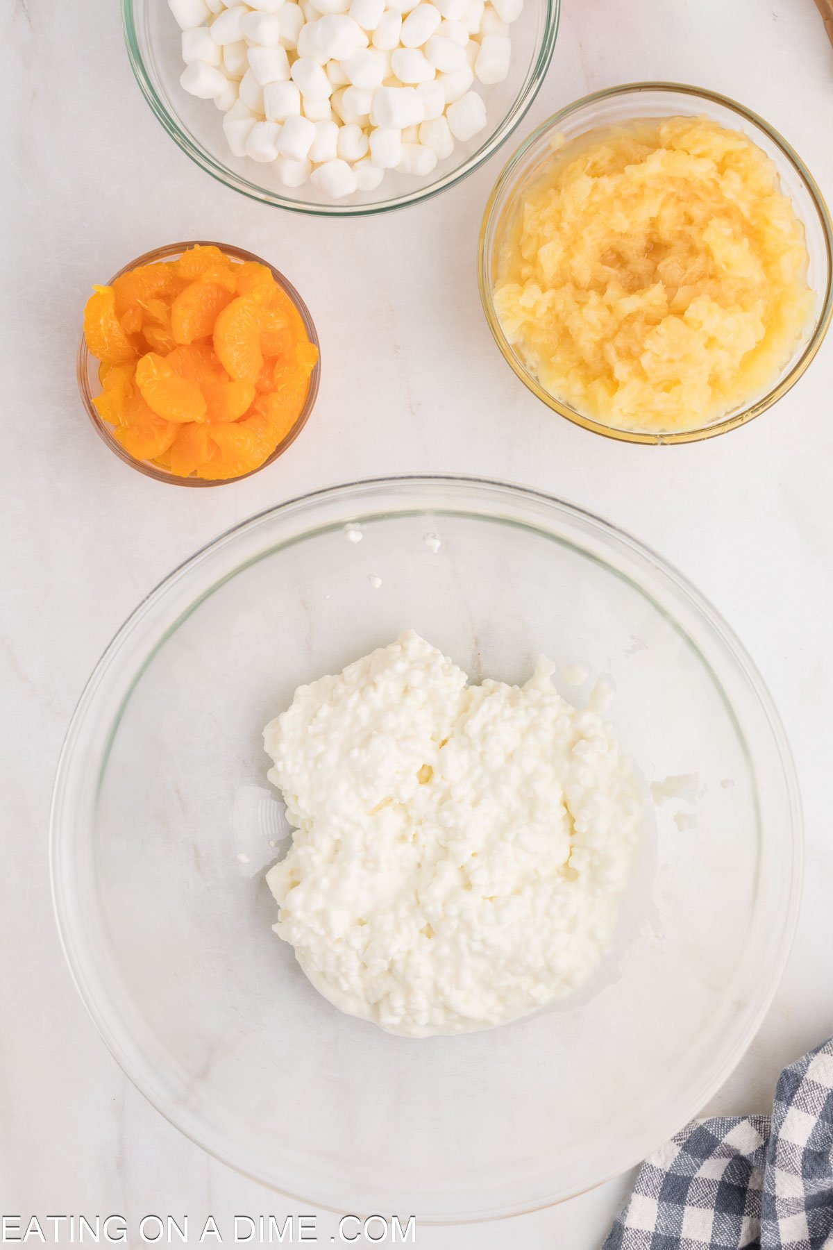 Placing the cottage cheese in a bowl