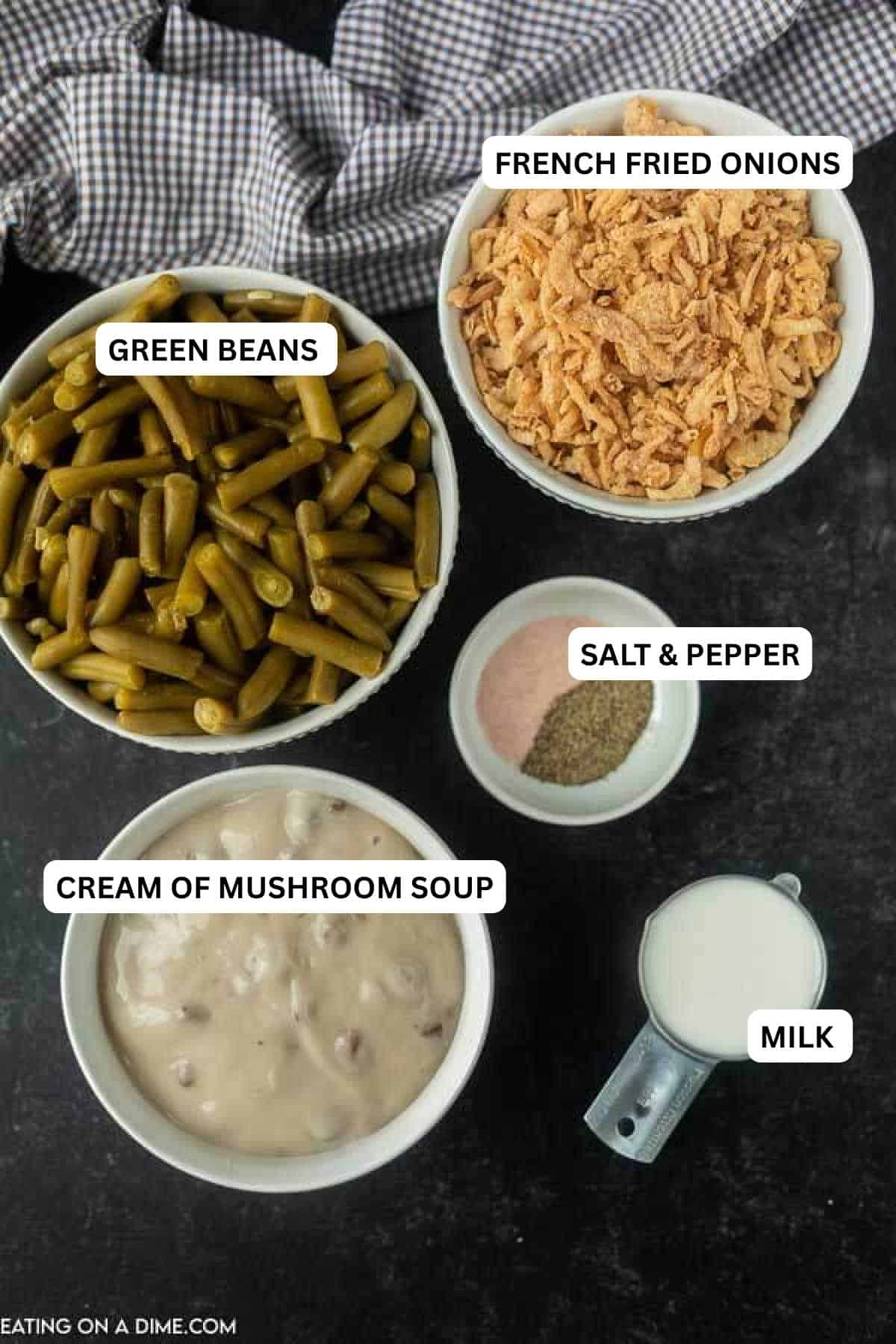 Free up the oven this holiday season with this Crock pot Green Bean Casserole Recipe! It turns out amazing and is one less dish to worry about! Recipe Ingredients - milk, cream of mushroom soup, salt and pepper, green beans, fried onions.