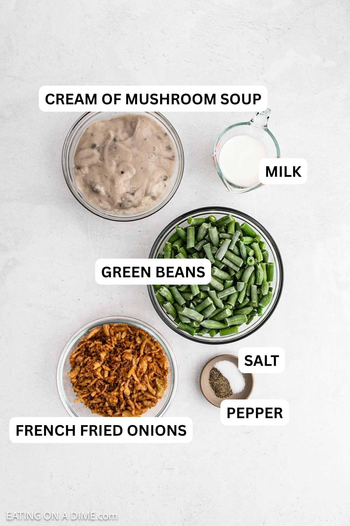 Ingredients needed for this recipe includes green beans, cream of mushroom soup, milk, salt, pepper, French fried onions.