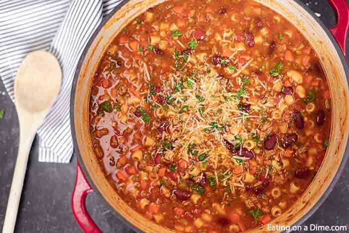 Pasta fagioli recipe is so filling and delicious. This Olive Garden copy cat pasta fagioli soup comes together quickly and makes an easy meal. This pasta fagioli soup recipe is quick on the stove top and so hearty for the best authentic Italian meal. #eatingonadime #pastafagiolisoup #OliveGardencopycat #OliveGardenItalian #pastafagiolisoupItalian