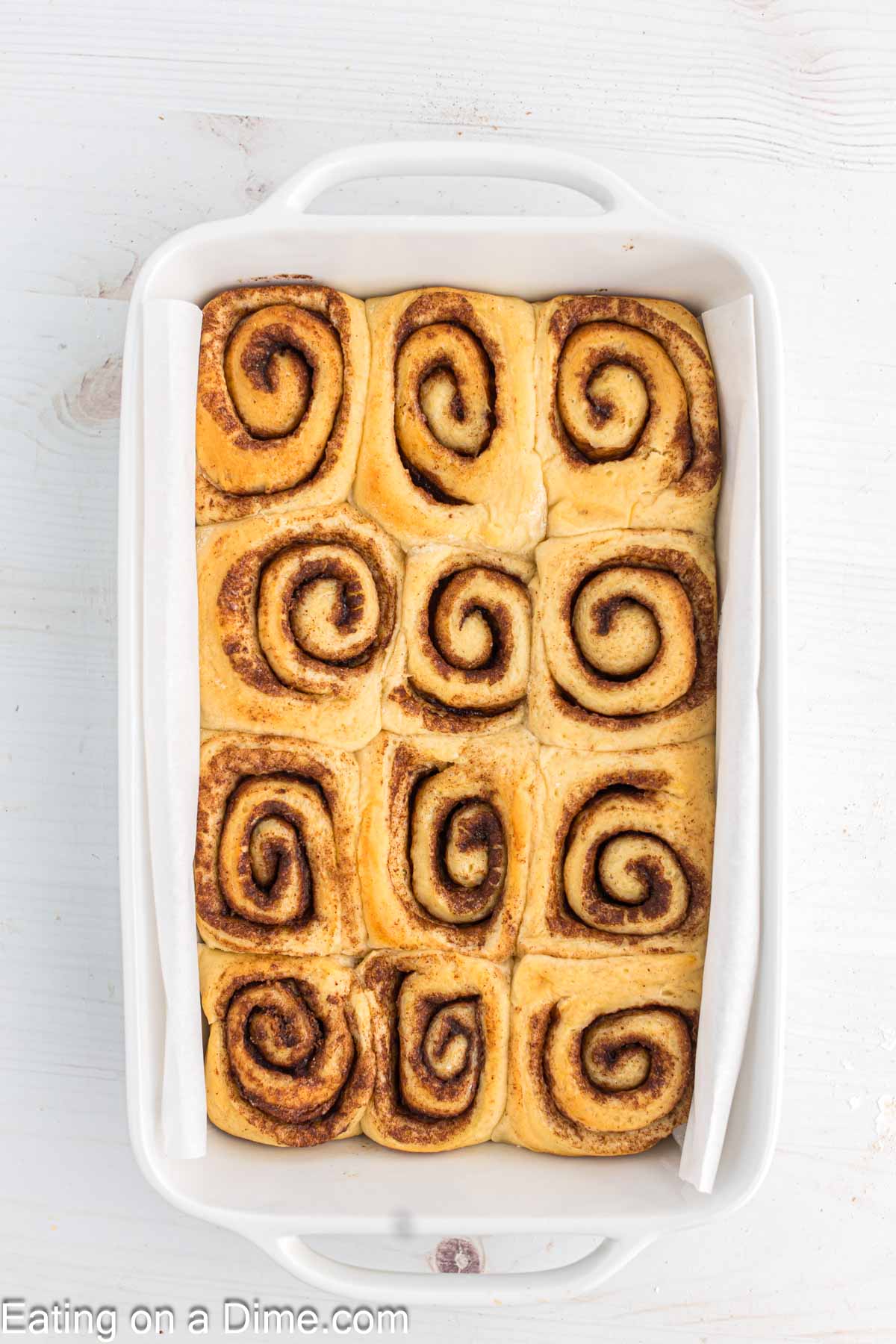 Baked cinnamon rolls in a baking dish