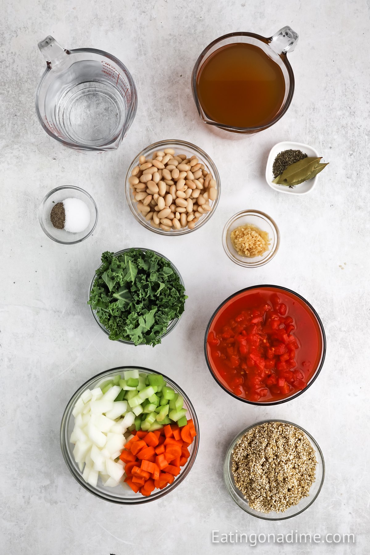 Ingredients needed - onion, carrots, celery, minced garlic, dried thyme, diced tomatoes, quinoa, vegetable broth, water, salt and pepper, bay leaves, great northern beans, kale 