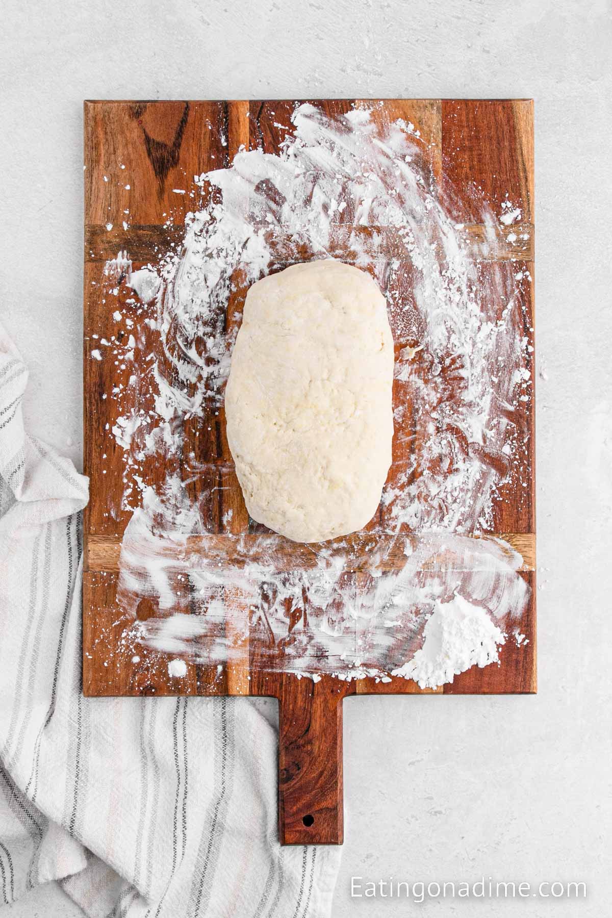 Kneading the dough on a floured surface