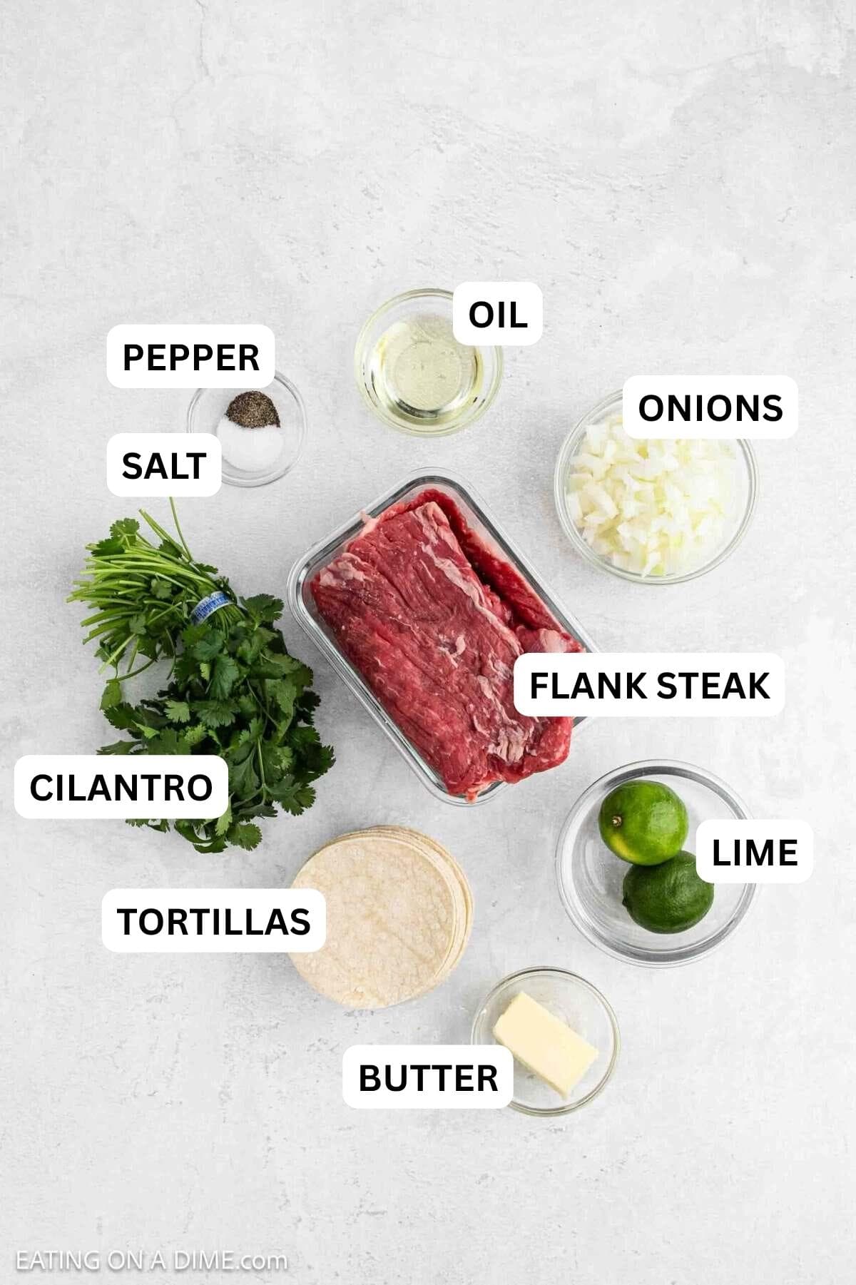 Ingredients needed to make this recipe which includes Flank Steak, oil, onions, limes, cilantro, butter, tortillas and salt and pepper.