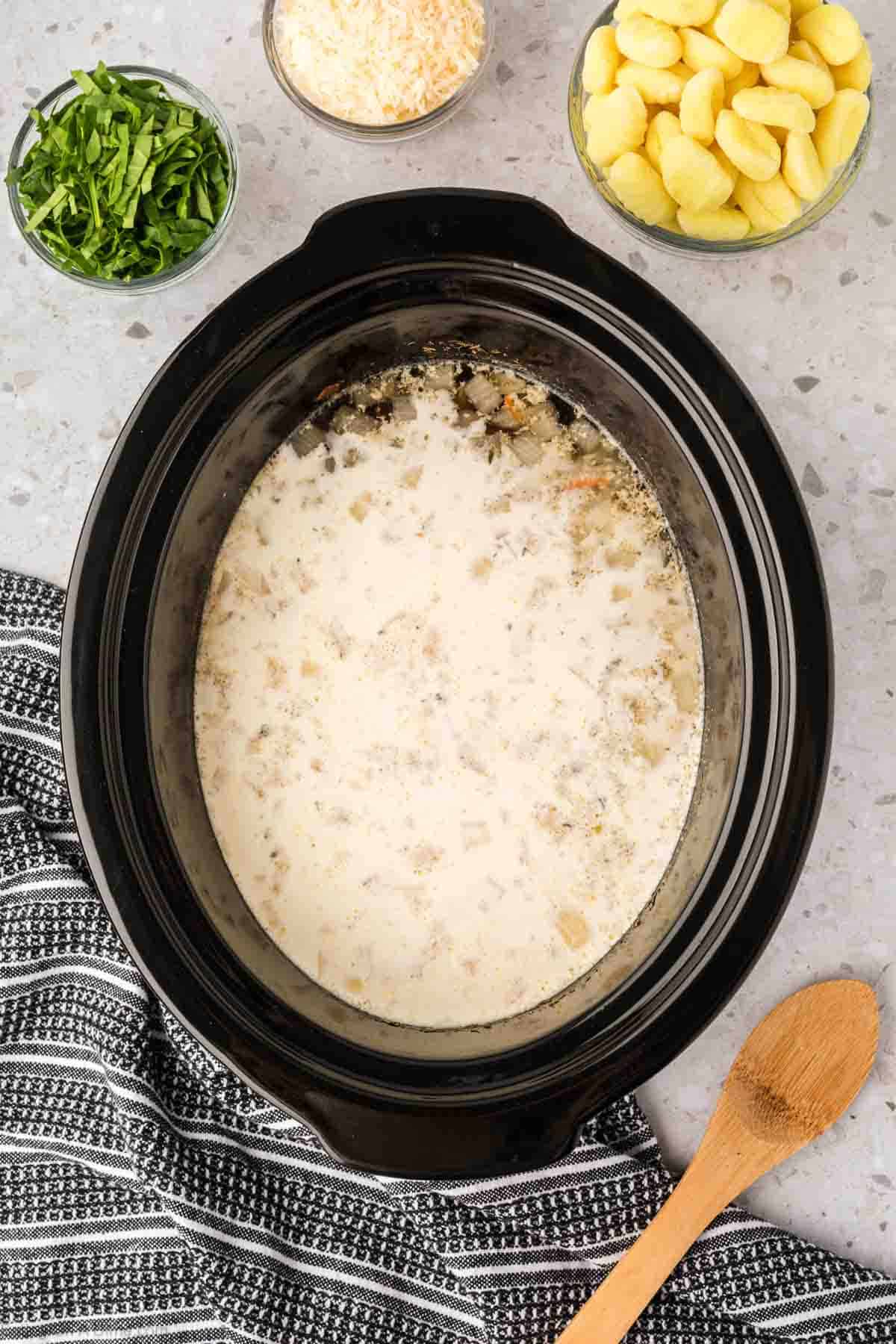 Pouring the cornstarch mixture in teh slow cooker