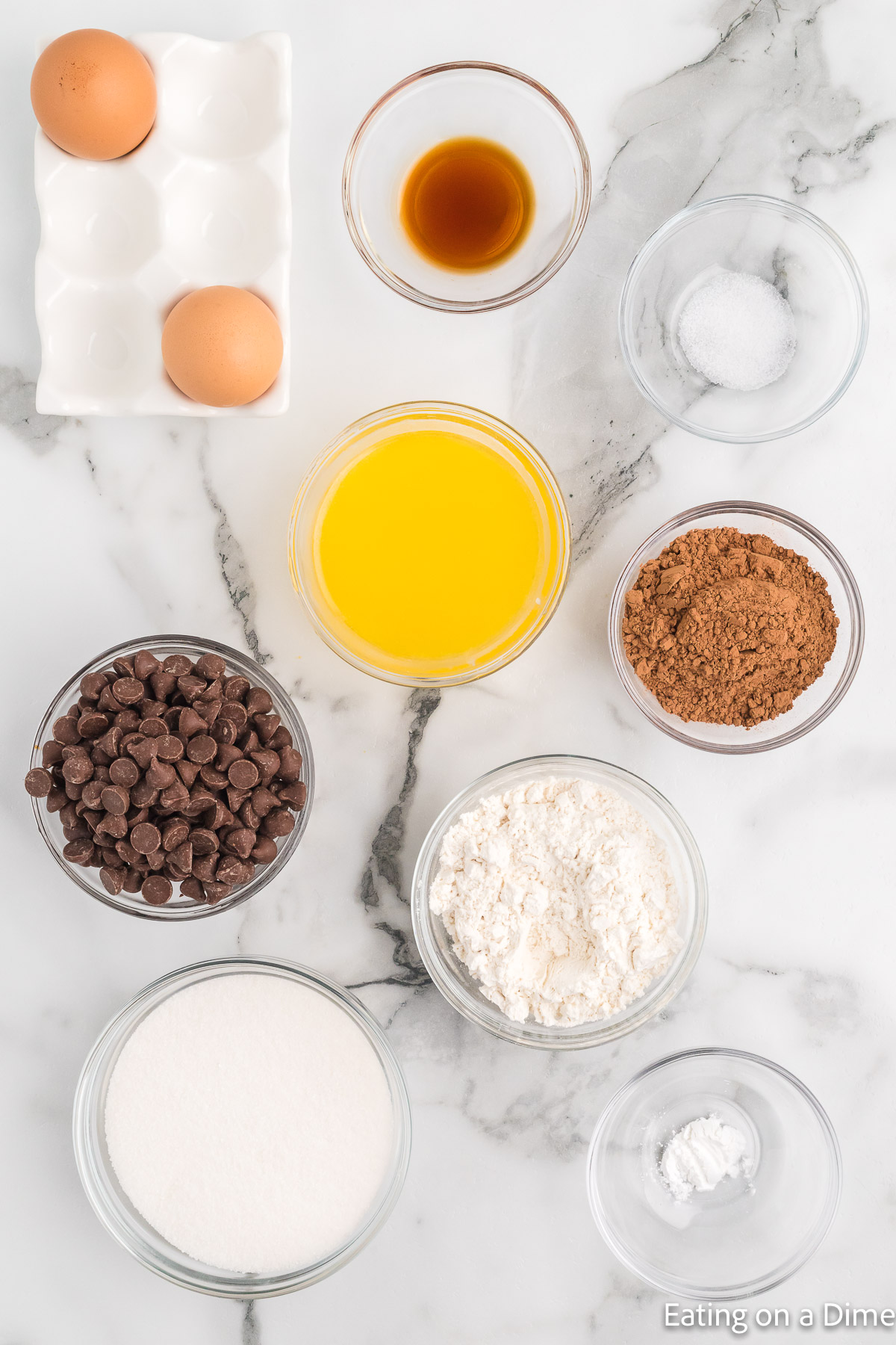 Chocolate Chip Brownie ingredients - sugar, cocoa powder, flour, salt, baking powder, eggs, butter, vanilla extract, chocolate chips