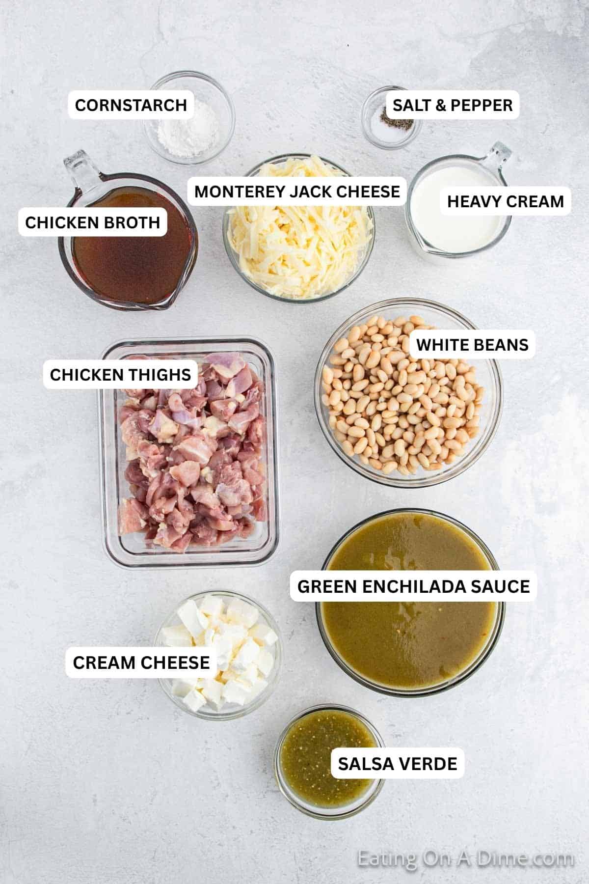 Ingredients for recipe: green enchiladas sauce, cream cheese, salsa verde, chicken thighs, white beans, chicken broth, monterey jack cheese, heavy cream, salt, pepper and cornstarch.