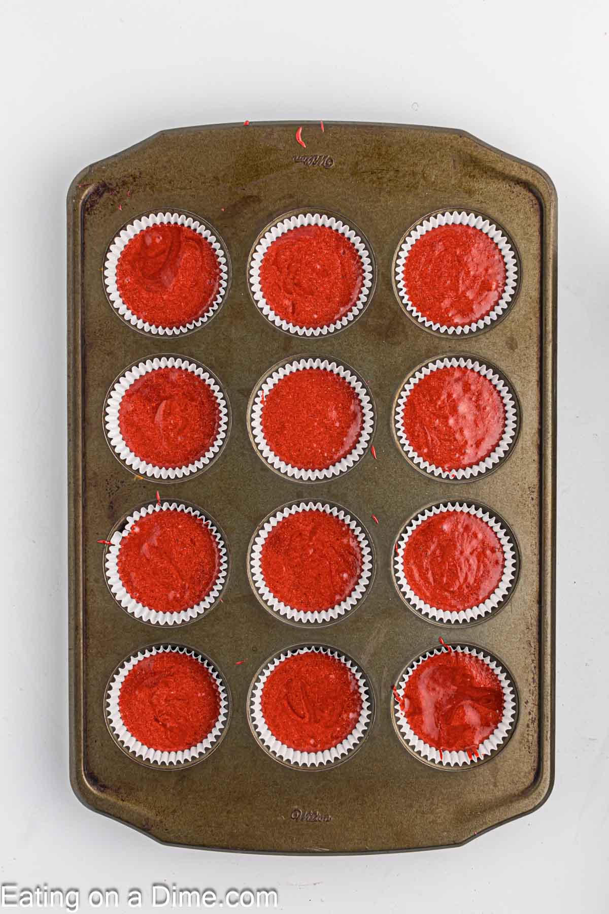 add to the cupcake liners in the muffin tin