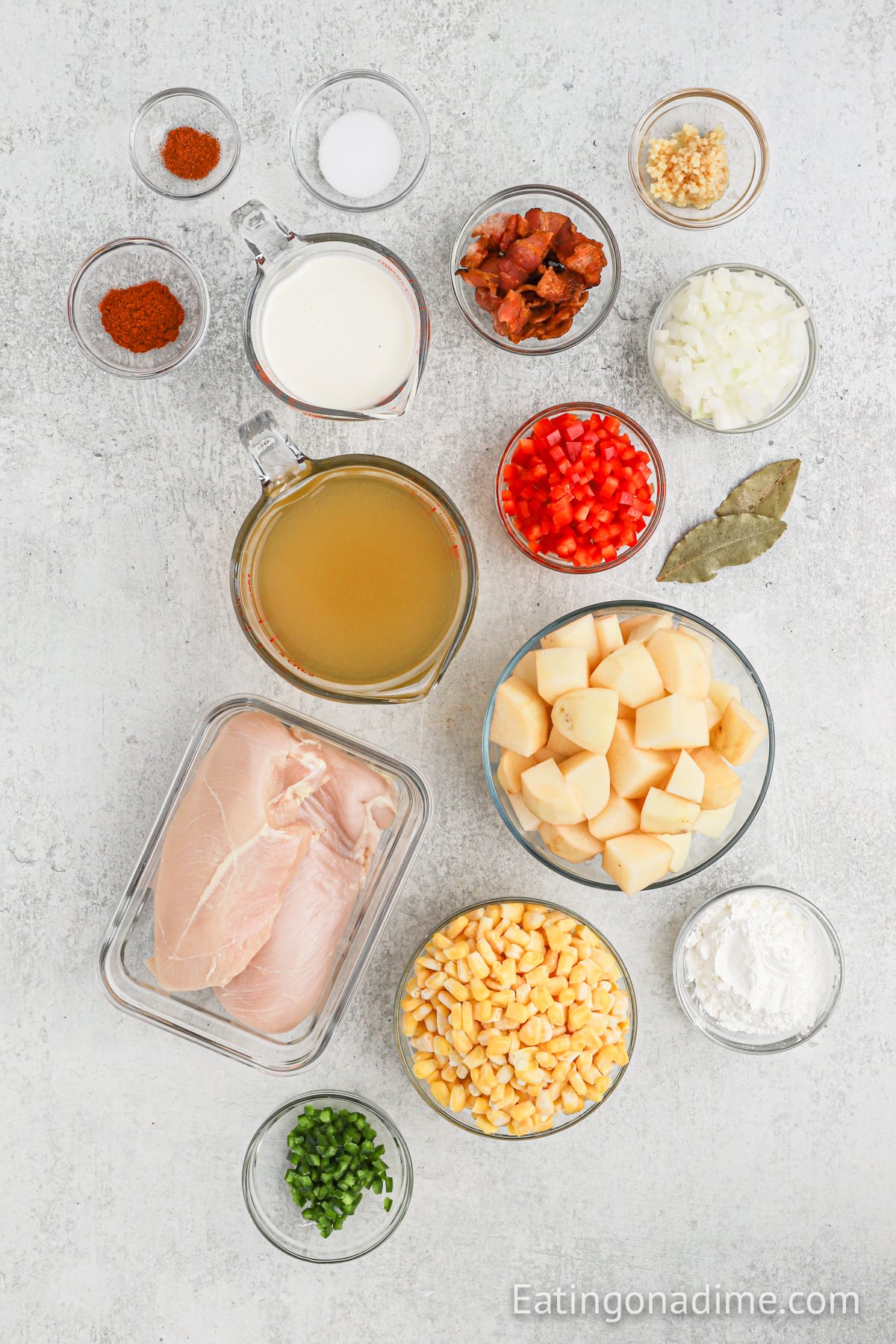 Ingredients needs - chicken, bacon, corn, yellow onion, potatoes, bell pepper, jalapeno, garlic, paprika, cayenne pepper, salt, bay leaves, chicken broth, heavy cream, cornstarch