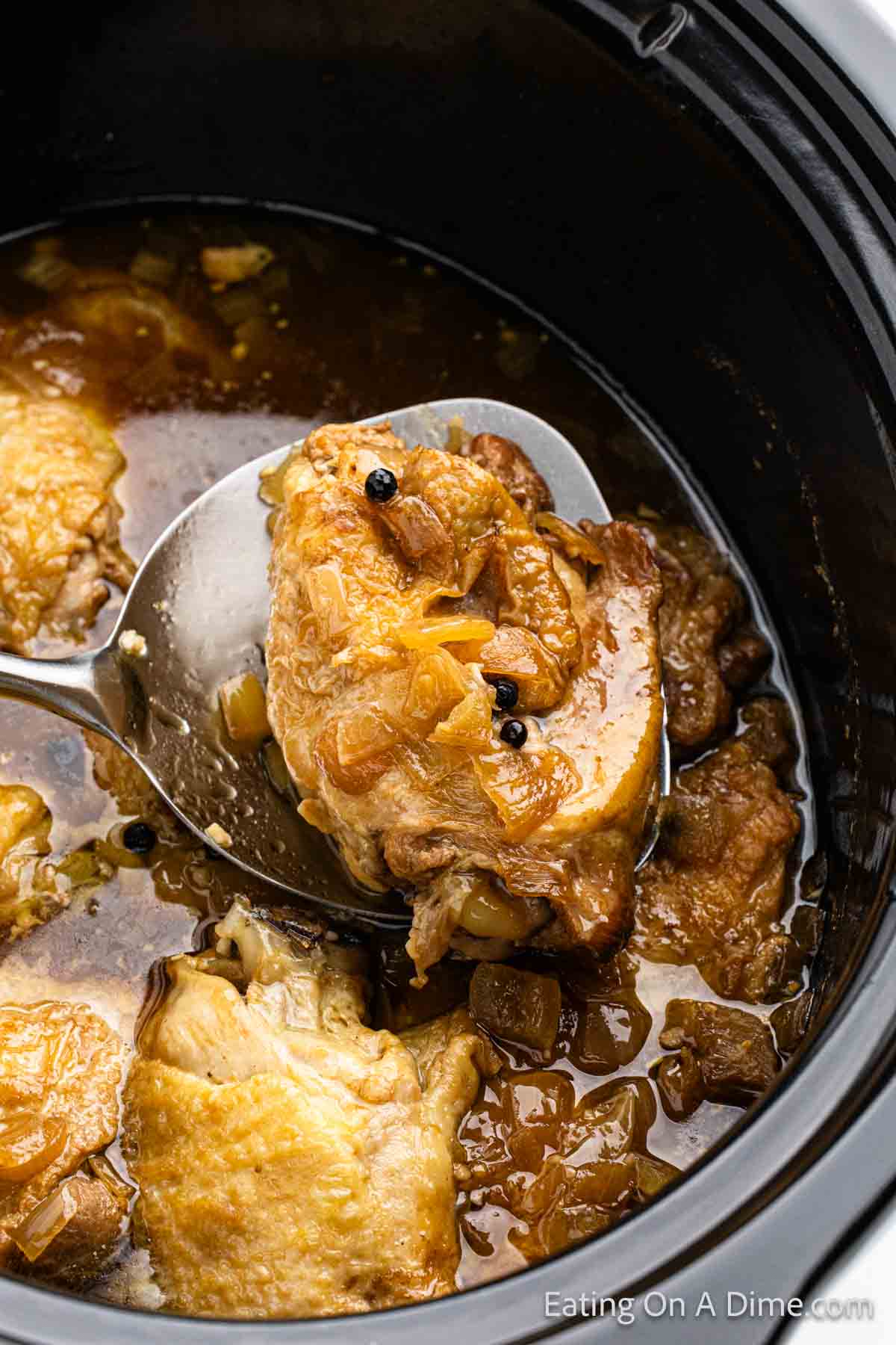 Close up image of chicken adobo in the slow cooker