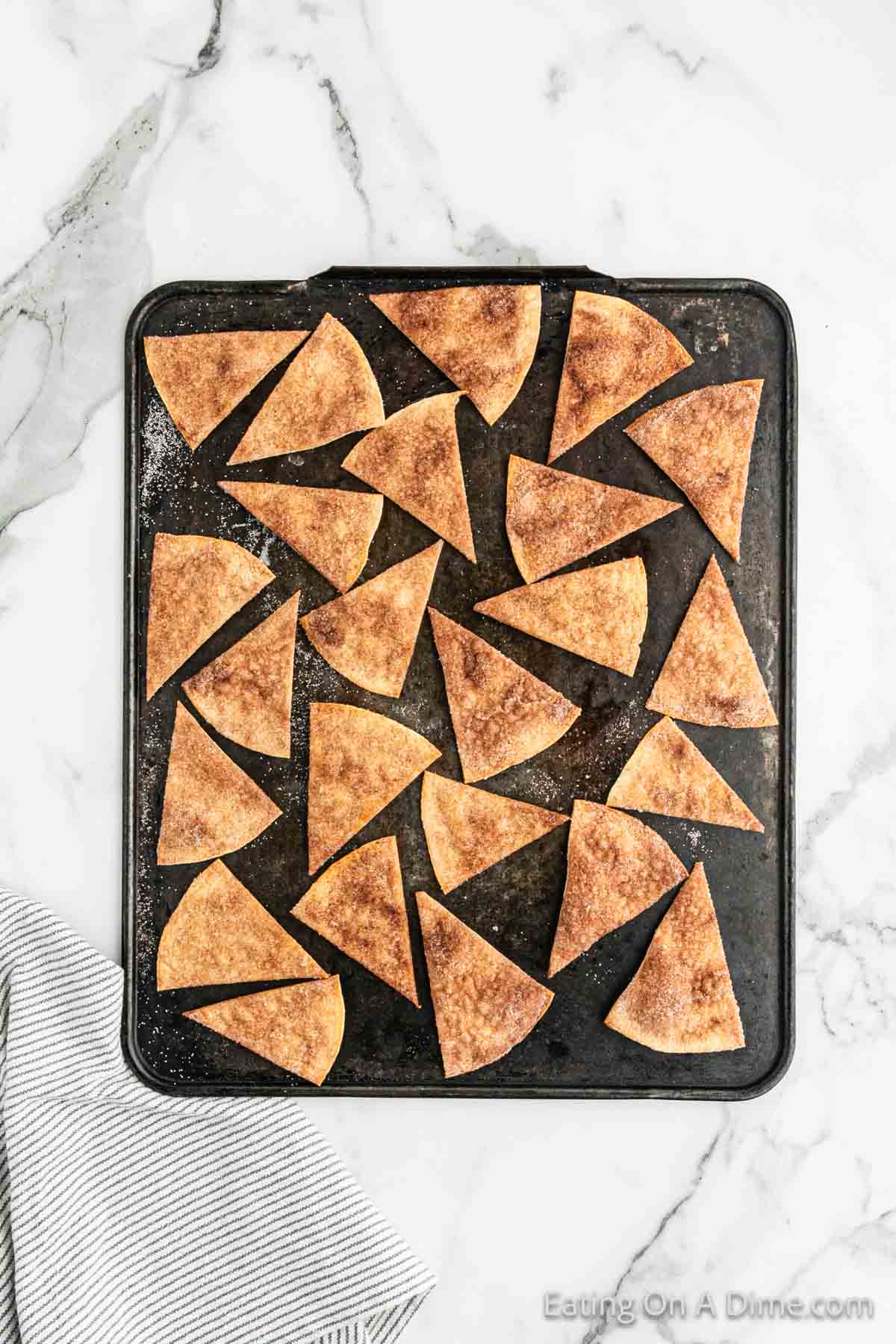 Cinnamon Tortilla Chips on a baking sheet