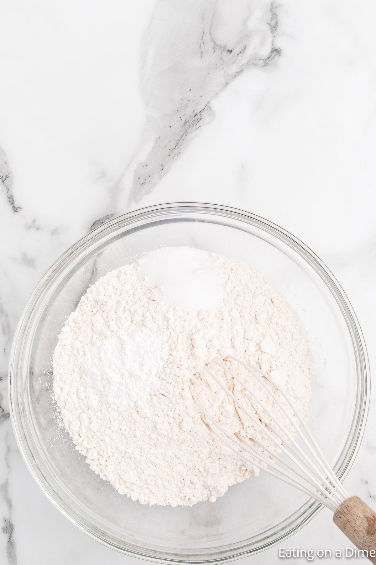Combining the dry ingredients in a bowl with a whisk