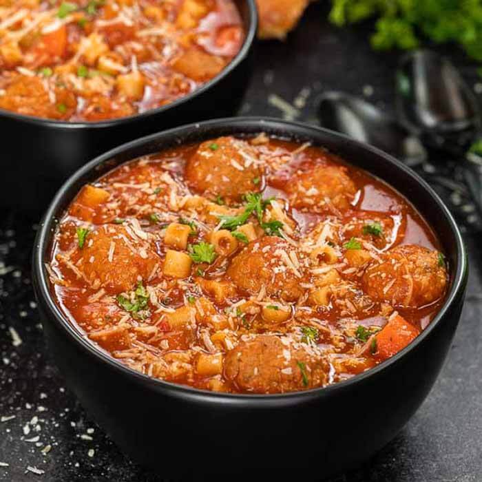 Crock pot Italian meatball soup is so tasty and really easy in the slow cooker. Make this toss and go meal in minutes for a great dinner. Slow Cooker Italian Meatball Soup with pasta is hearty and the best homemade meal. Try this easy Crock Pot Italian Meatball Soup with frozen meatballs today. The slow-cooker makes it quick and easy. #eatingonadime #italianmeatballsoup #crockpot #recipes #CrockpotEasyRecipes #marinarasauce #slowcooker Crock pot Italian meatball soup is so tasty and really easy in the slow cooker. Make this toss and go meal in minutes for a great dinner. Slow Cooker Italian Meatball Soup with pasta is hearty and the best homemade meal. Try this easy Crock Pot Italian Meatball Soup with frozen meatballs today. The slow-cooker makes it quick and easy. #eatingonadime #italianmeatballsoup #crockpot #recipes #CrockpotEasyRecipes #marinarasauce #slowcooker