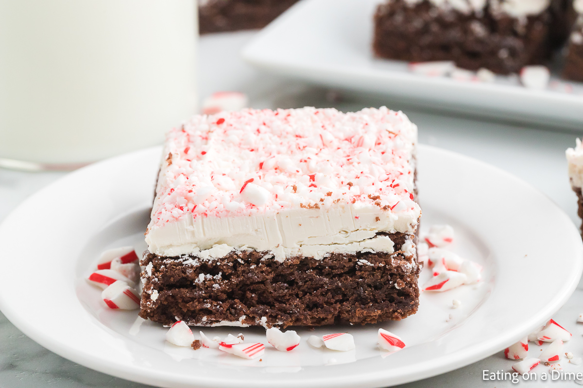 Slice of white chocolate peppermint brownies on a plate