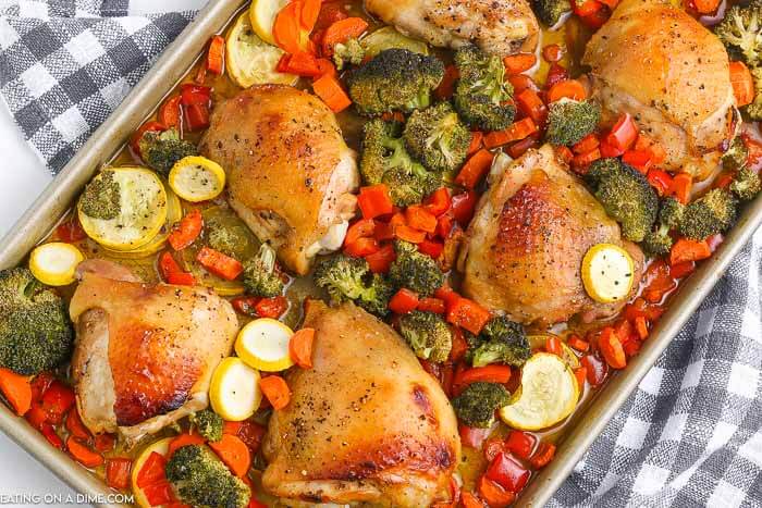 Make this easy sheet pan chicken thigh dinner for the best meal with little cleanup and only one pan. Everything you need for dinner is on the baking sheet. Enjoy bone in thighs and vegetables for a quick and easy meal. Learn how to make sheet pan chicken thighs and veggies. Try sheet pan chicken thighs and vegetables for a simple and delicious dinner. #eatingonadime #sheetpanchickethighs #recipes #sheetpanchickenthighsbonein #andveggies #andbroccoli 