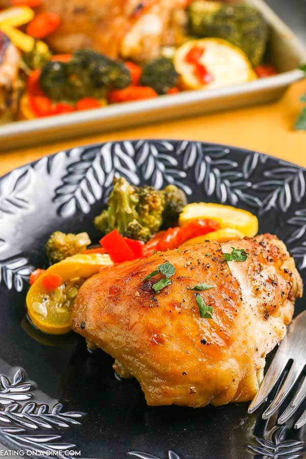 Make this easy sheet pan chicken thigh dinner for the best meal with little cleanup and only one pan. Everything you need for dinner is on the baking sheet. Enjoy bone in thighs and vegetables for a quick and easy meal. Learn how to make sheet pan chicken thighs and veggies. Try sheet pan chicken thighs and vegetables for a simple and delicious dinner. #eatingonadime #sheetpanchickethighs #recipes #sheetpanchickenthighsbonein #andveggies #andbroccoli 