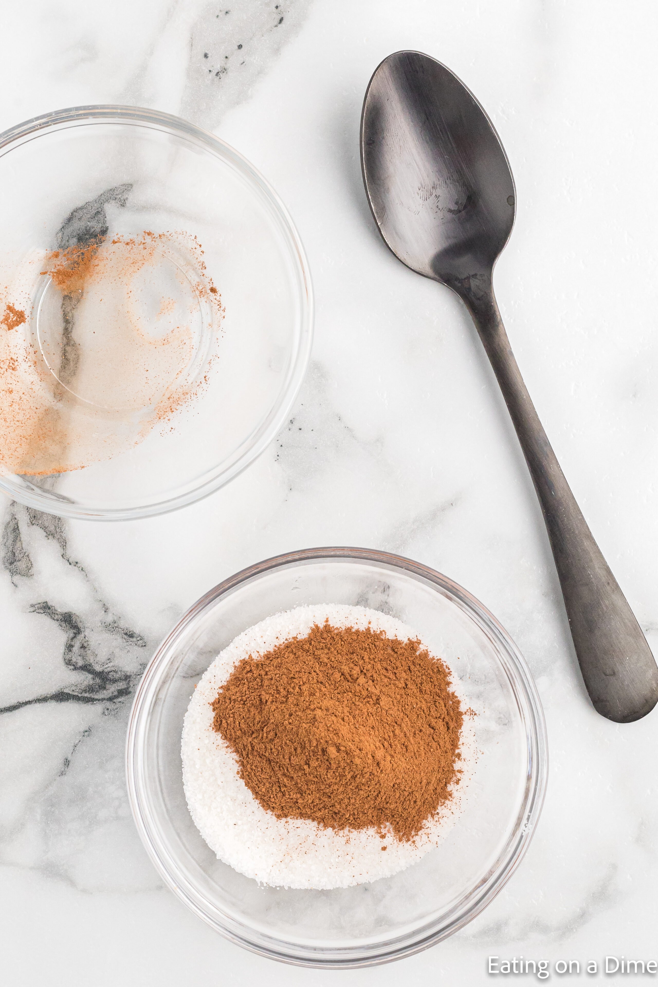 Combining the cinnamon and sugar in a small bowl