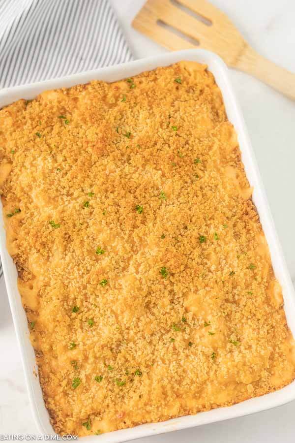 Close up image of baked mac and cheese in a 9x13 pan.