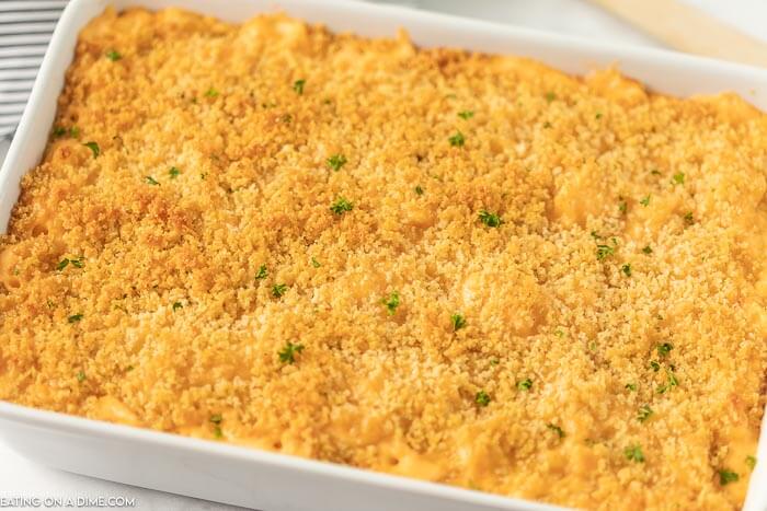Close up image of a 9x13 pan of baked mac and cheese. 