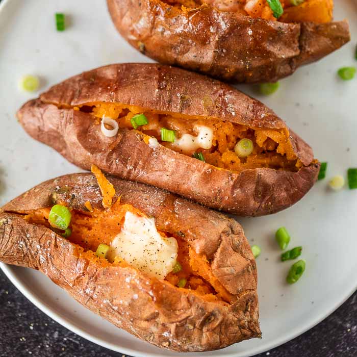 Crockpot sweet potatoes make such an easy and healthy side dish. The slow cooker does all of the work and it's also a great way to meal prep. Enjoy crock pot baked sweet potatoes without heating up the oven. Learn how to bake slow cooker sweet potatoes for a simple side dish. #eatingonadime #crockpotsweetpotatoes #thanksgiving #recipes #baked #howto #howtocook #sweetpotatoesinthecrockpot #bakedsweetpotatoesincrockpot