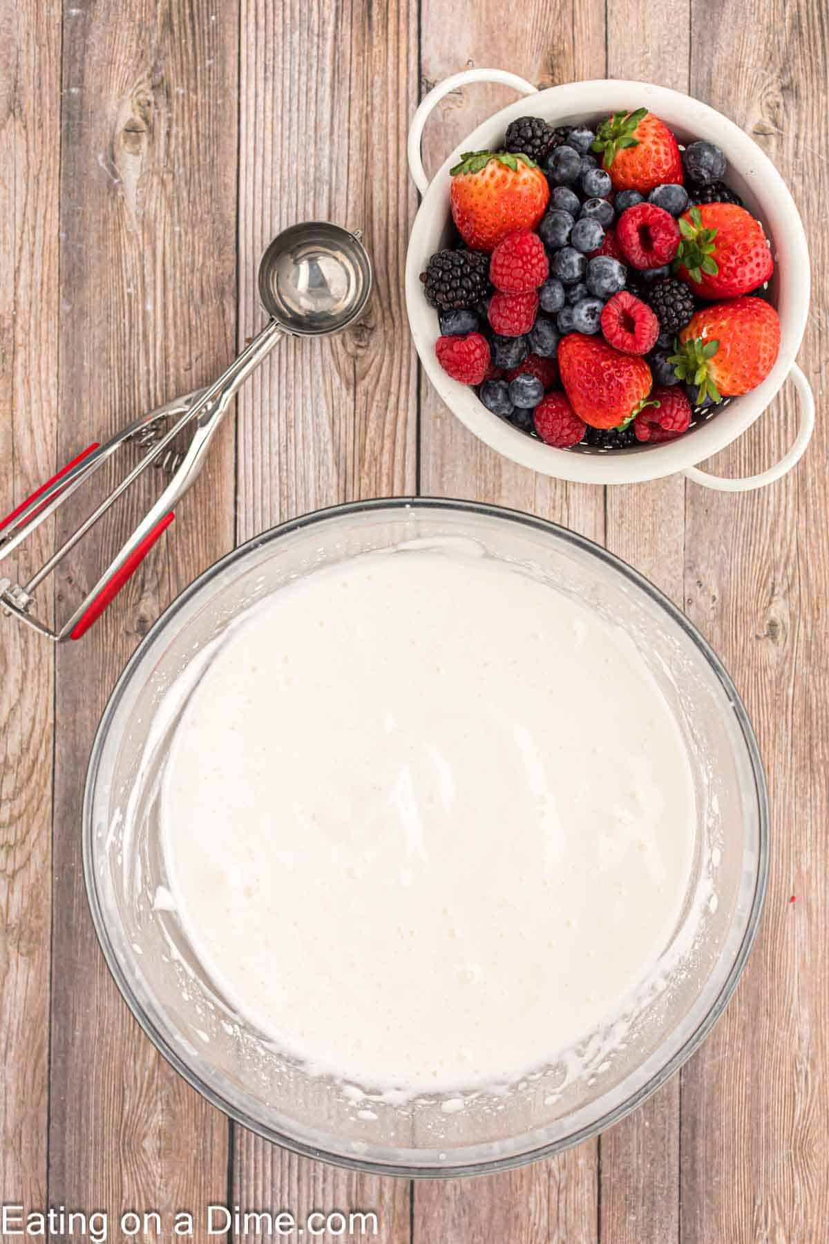 Combine the angel food cake ingredients in a bowl with a bowl of fresh fruit on the side
