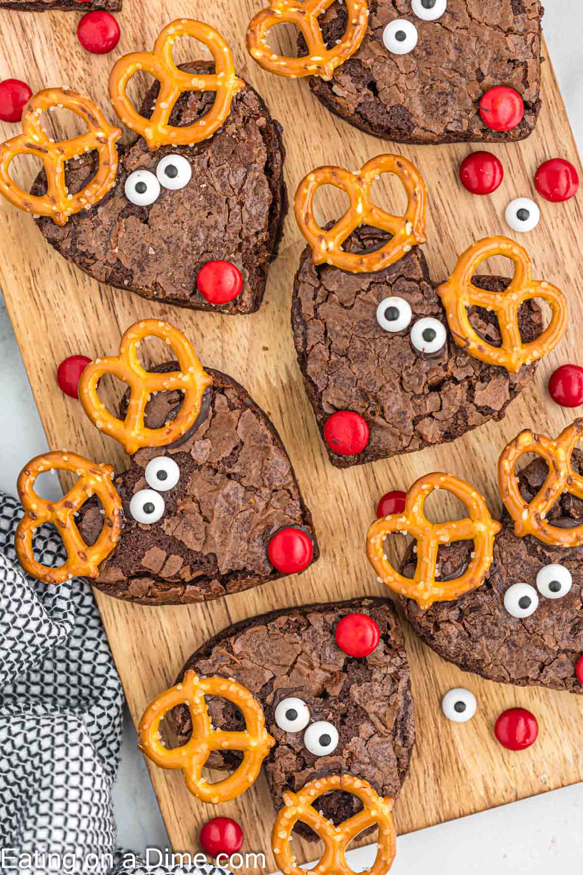 Decorated Reindeer brownies on a cutting board