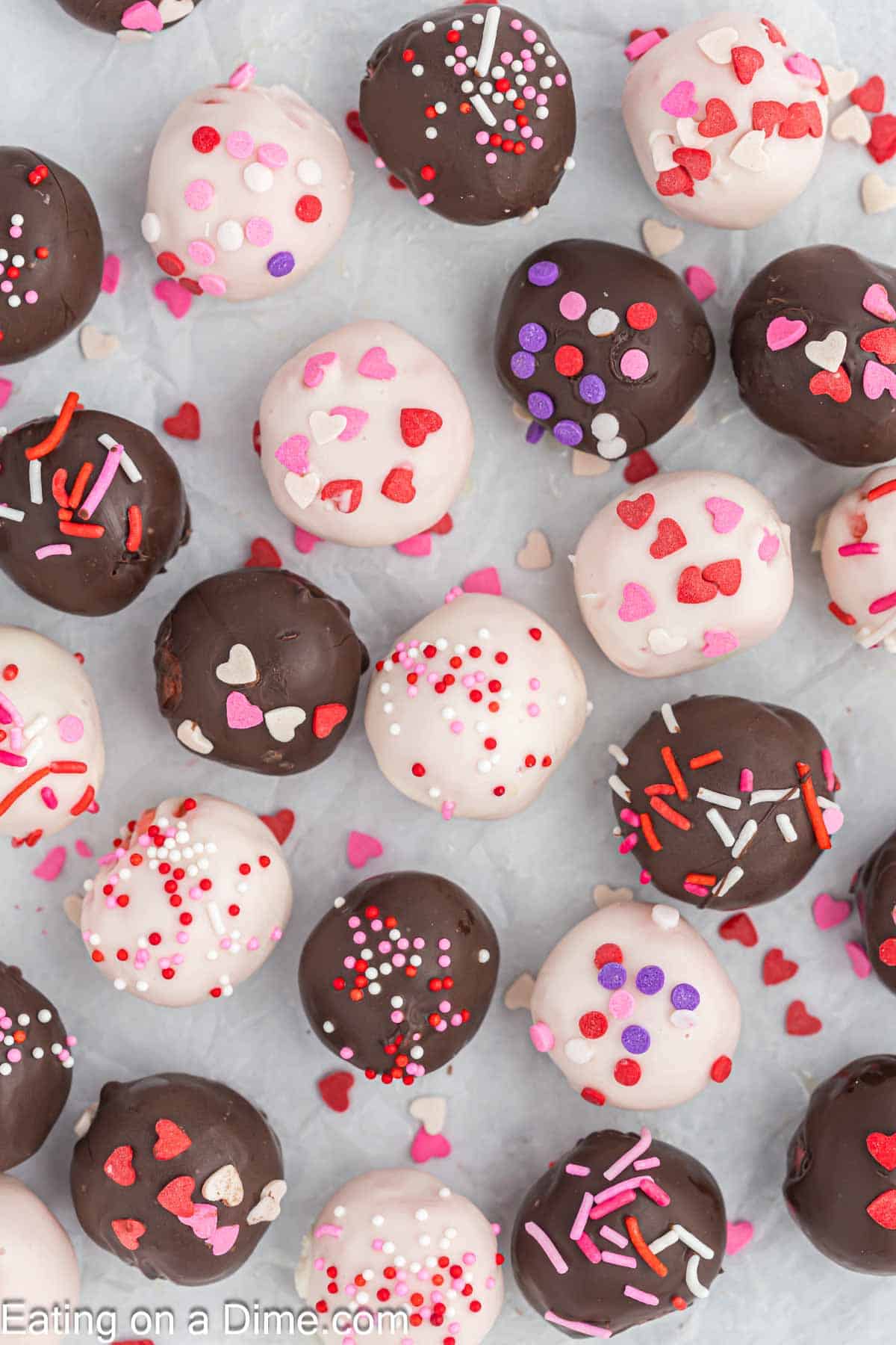 Valentines Cake Balls stacked on parchment paper