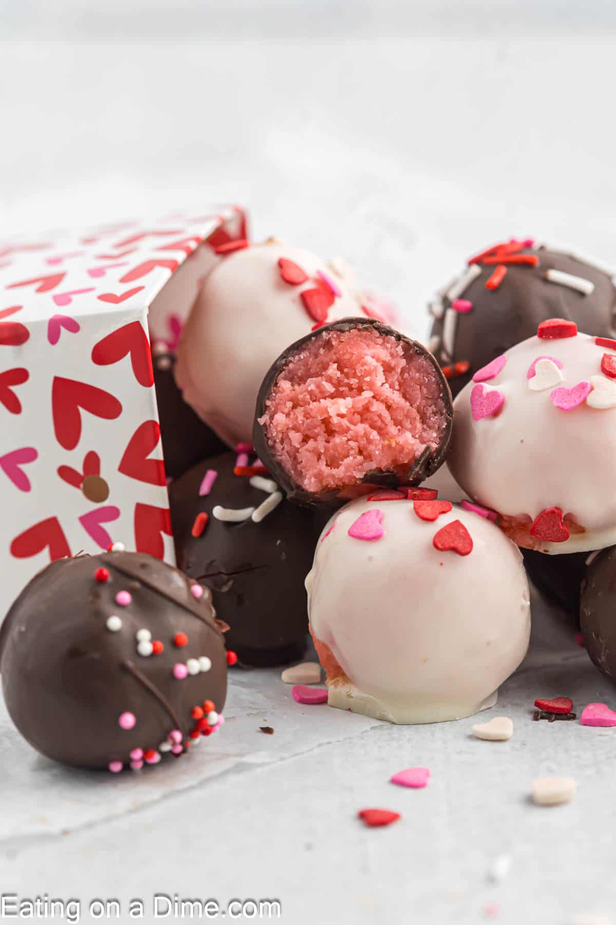Valentine Cake Balls stacked in a box