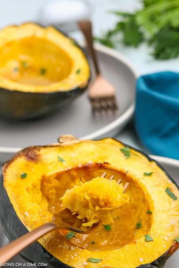 Roasted acorn squash recipe is super easy and really healthy. You only need 5 ingredients for this flavor packed side dish. Learn how to roast acorn squash in oven with brown sugar and maple syrup. Find out how to roast acorn squash for a savory or sweet side dish option. #eatingonadime #roastedacornsquash #recipes #recipeshealthy #Recipesbrownsugar #roastedacornsquashoven #Howlongto #oven #howto
