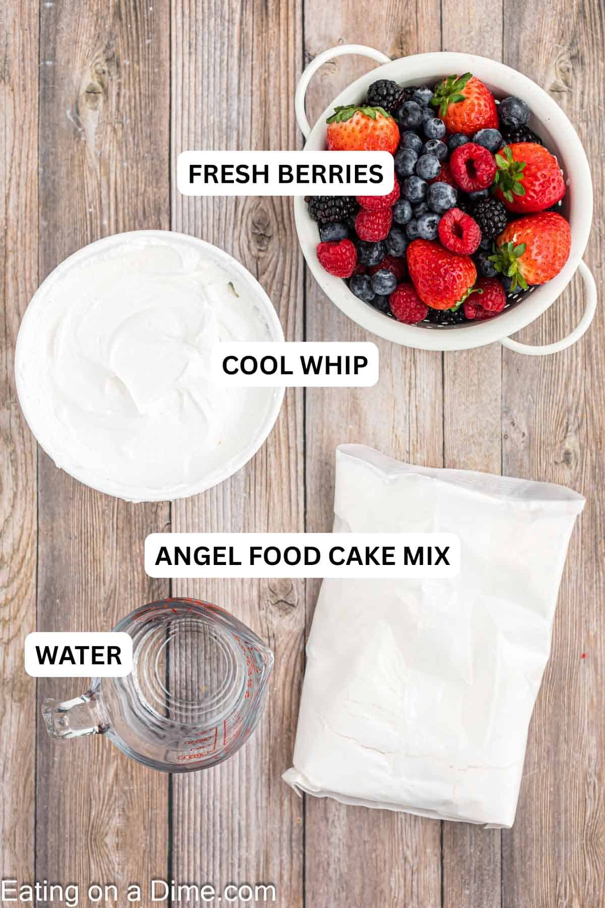 Ingredients for recipe: angel food cake mix, water, cool whip and fresh strawberries.