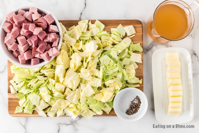 Crock pot ham and cabbage recipe is the best way to use leftover ham. The entire dish is slow cooked to perfection and packed with flavor. Make ham and cabbage for a budget friendly dinner. Slow Cooker ham and cabbage is so easy and delicious. #eatingonadime #crockpothamandcabbage #hamandcabbagerecipescrockpots #hamandcabbagecrockpot
