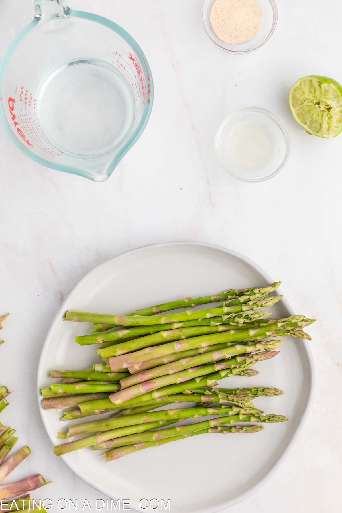 Steamed Asparagus ingredients - asparagus stems, water, garlic salt, lime