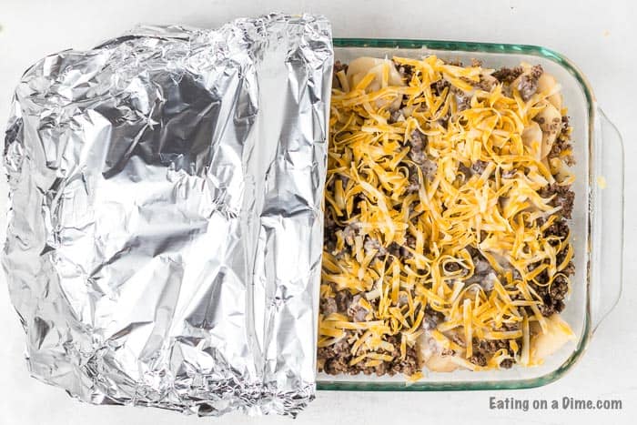 Covering the casserole with foil