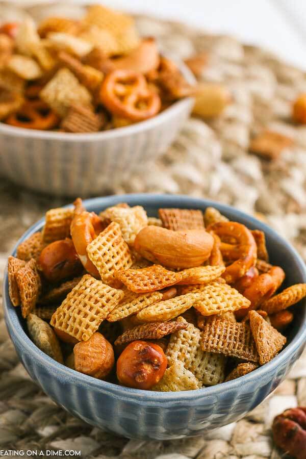 Chex party mix recipe is a delicious appetizer and snack around here. We make this homemade Chex mix with Worcestershire sauce for holidays, Game Day, birthdays and more. It is easy and frugal. Learn how to make this traditional, savory Chex party mix recipe. This original Chex mix recipe is the best! #eatingonadime #snackrecipes #chexmixrecipes #appetizerrecipes 