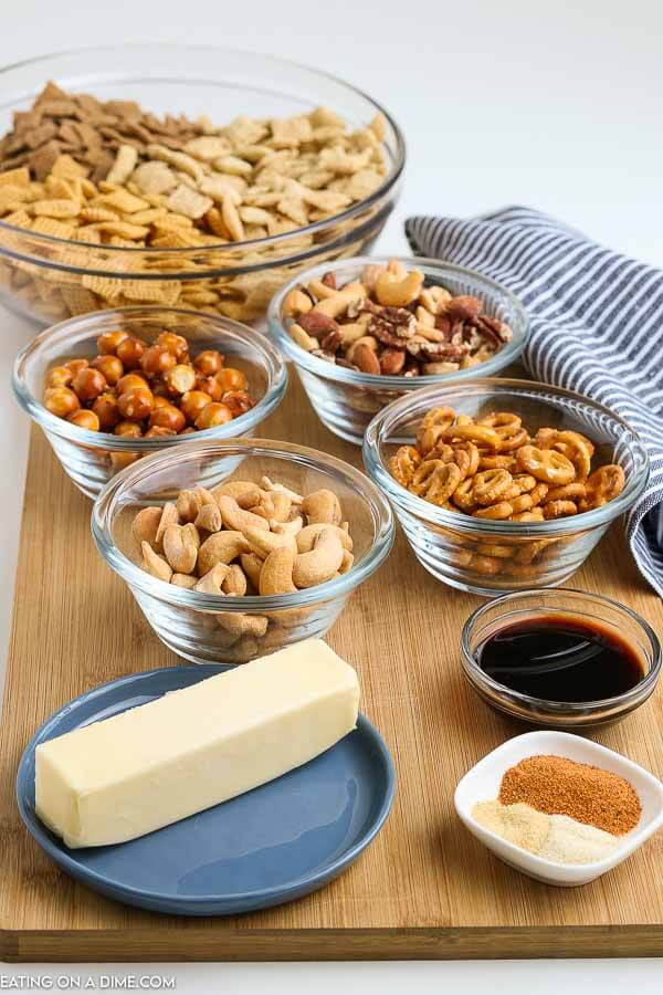 Chex party mix recipe is a delicious appetizer and snack around here. We make this homemade Chex mix with Worcestershire sauce for holidays, Game Day, birthdays and more. It is easy and frugal. Learn how to make this traditional, savory Chex party mix recipe. This original Chex mix recipe is the best! #eatingonadime #snackrecipes #chexmixrecipes #appetizerrecipes 