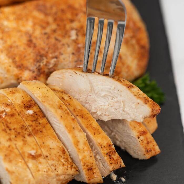 Air fryer chicken breast recipes make an easy and delicious weeknight dinner idea. Each bite is moist and juicy while being simple to prepare. Learn how to make Air fryer chicken that is perfect and healthy. #eatingonadime #airfryerchicken #AirFryerRecipes #boneless