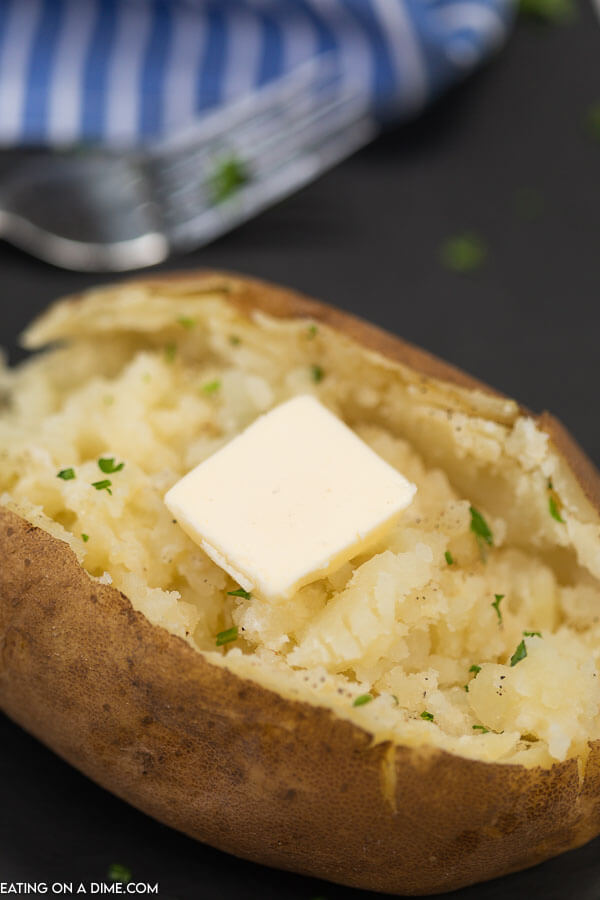 Enjoy easy to make instant pot baked potatoes recipe in 15 minutes. This is the best ever baked potato in a fraction of the time as the oven. Try the best baked potatoes in instant pot for an easy and simple side dish. Pressure cooker baked potatoes are perfect when you need something quick. #eatingonadime #instantpotbakedpotatoes #bakedpotatoesinstantpot #instantpotbakedpotatoeslarge #seasoned #instantpotbakedpotatoesrusset #bakedpotatoes #bakedpotatoesininstantpotrecipe