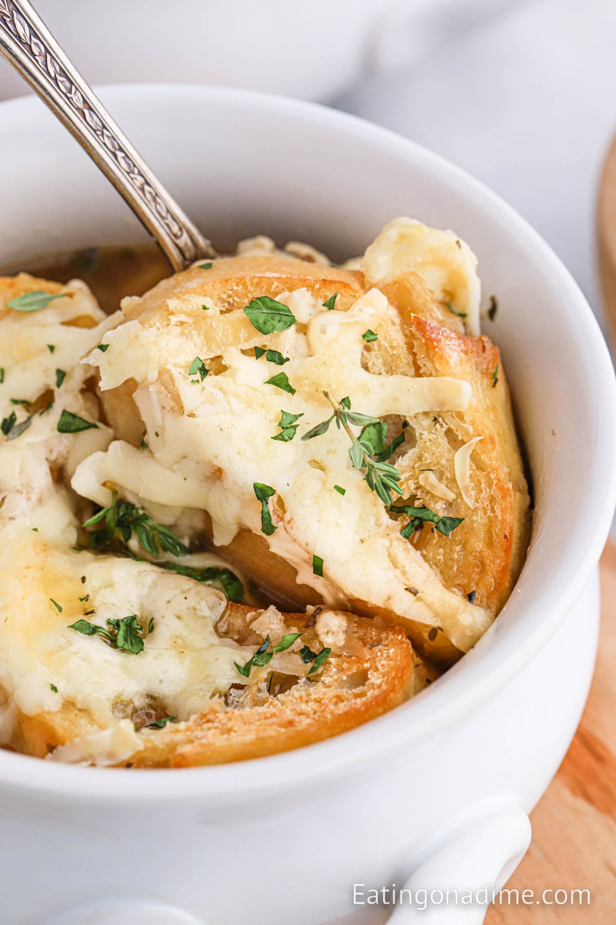 Close up image French Onion Soup in a bowl