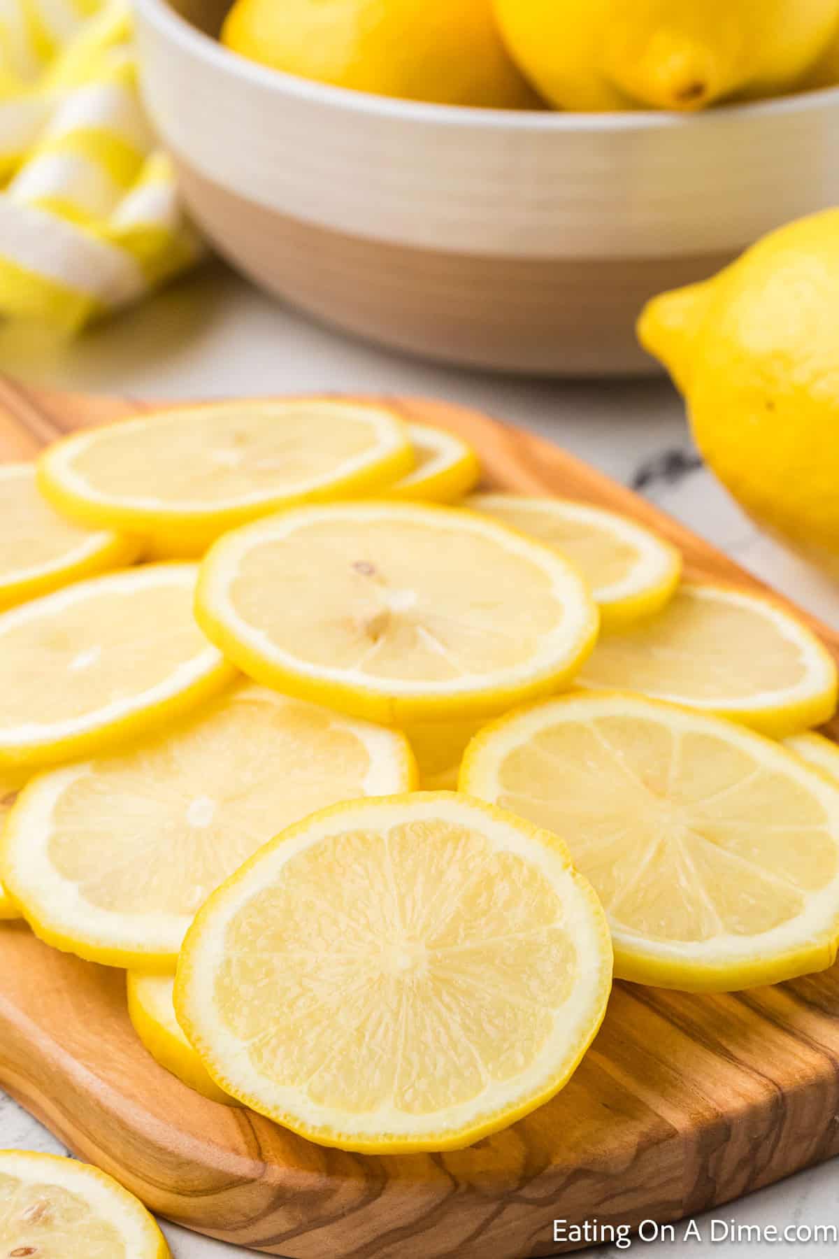 Lemon Slices stacked on a wooden board