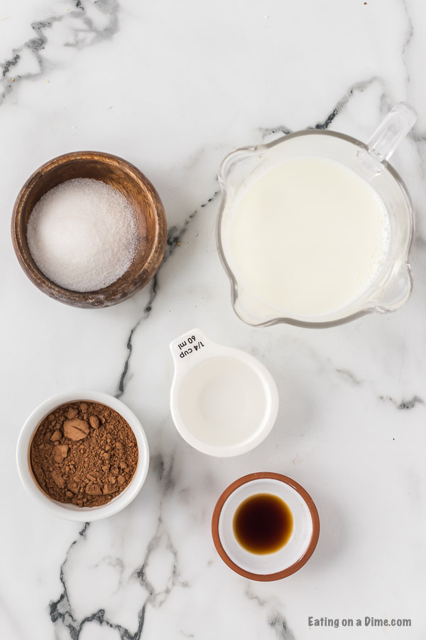 Ingredients for recipe: sugar, cocoa powder, milk, vanilla. 