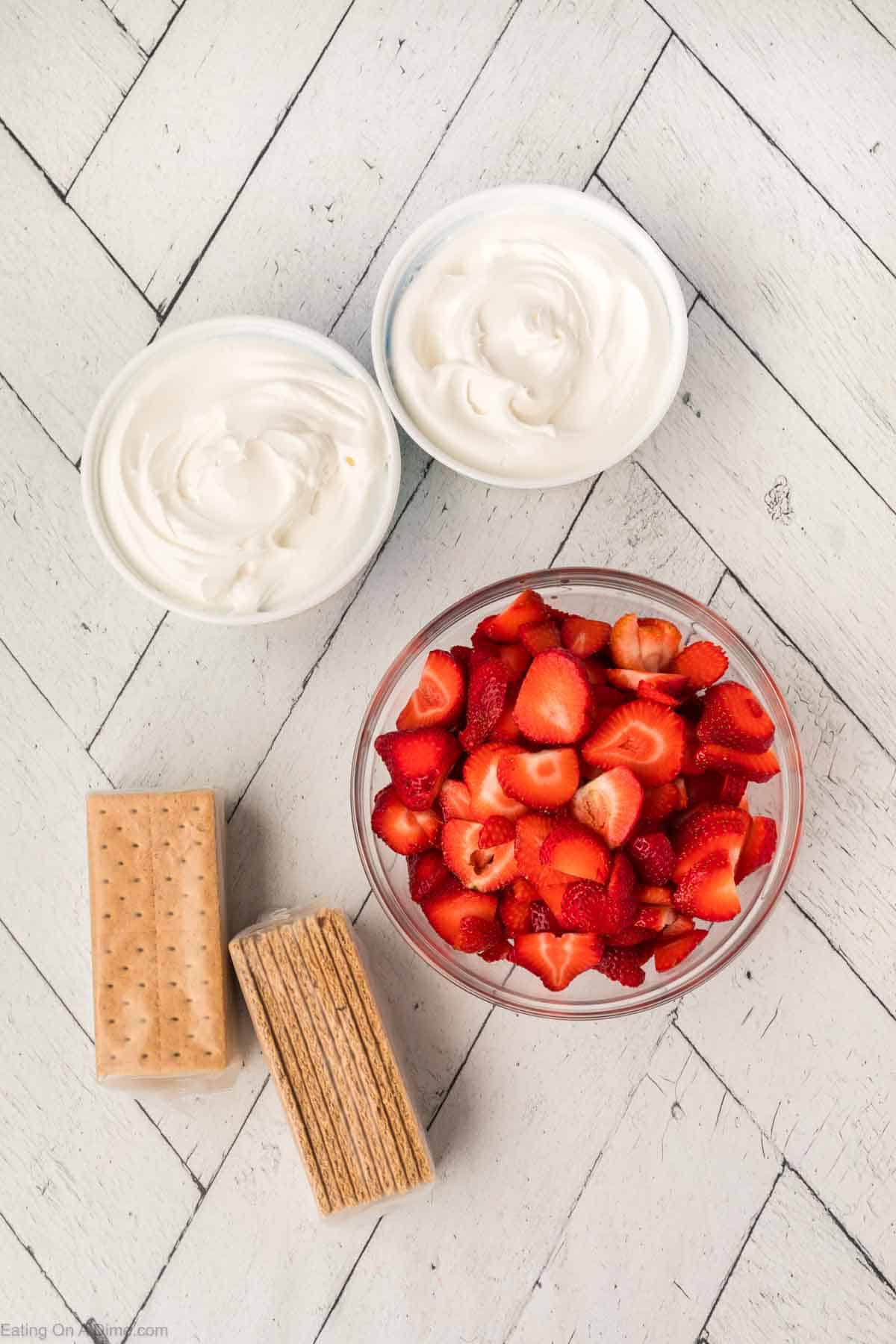Strawberries, cool whip and graham crackers