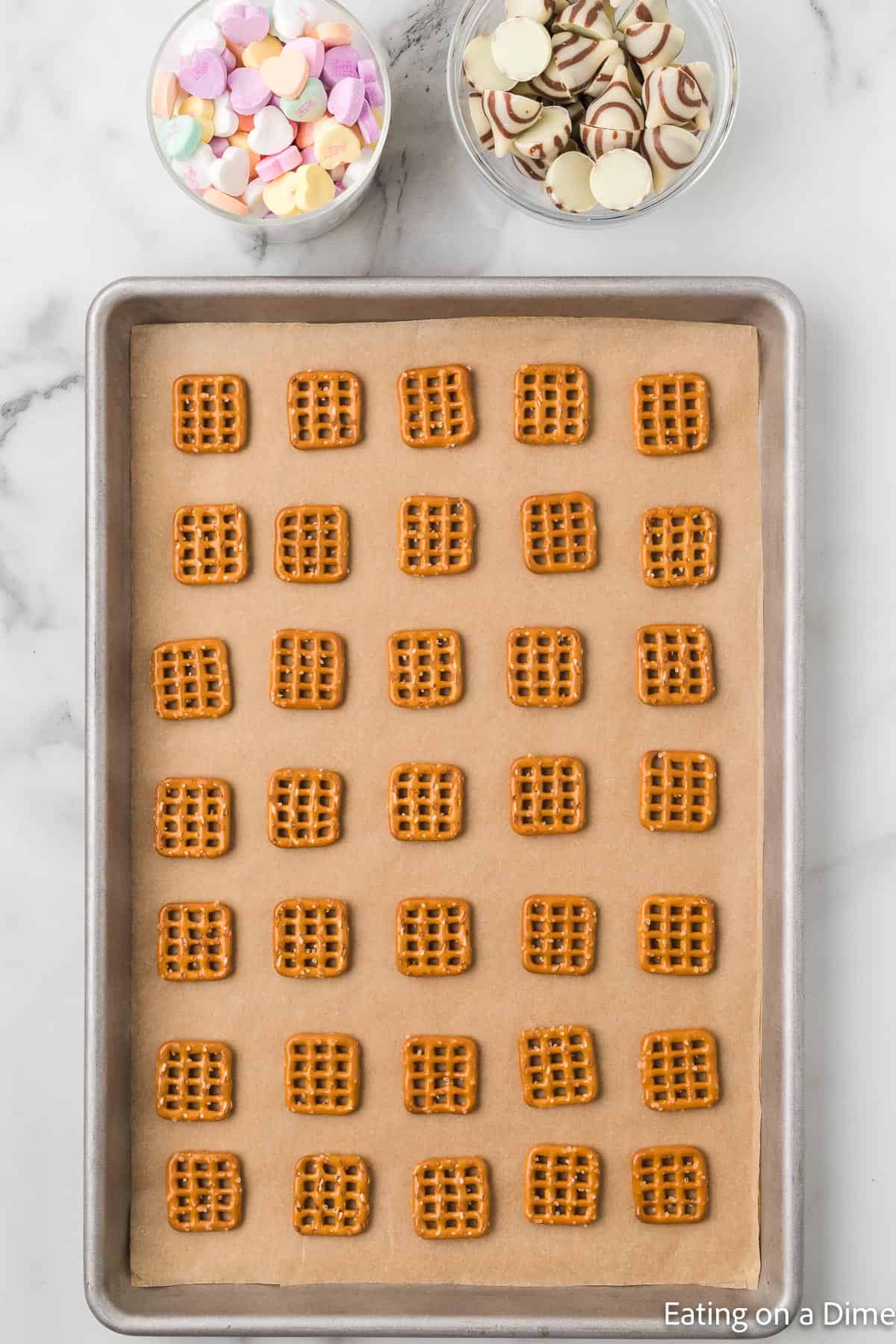 Placing the pretzels on a baking sheet