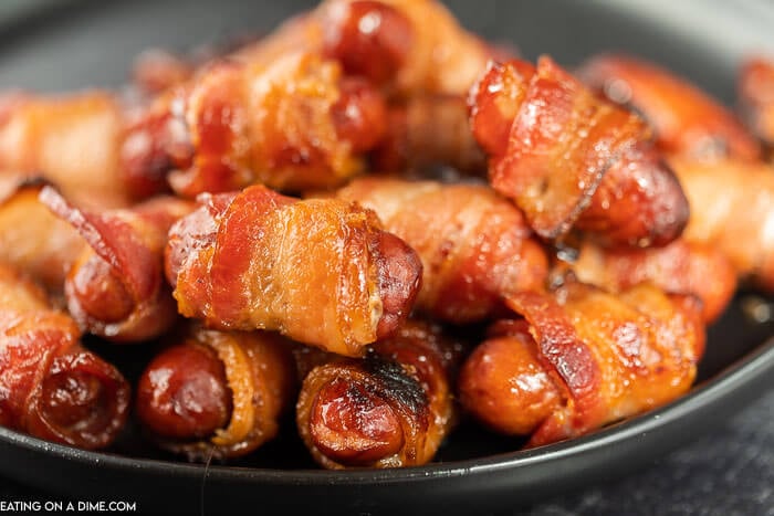 Close up image of bacon wrapped lil smokies. 